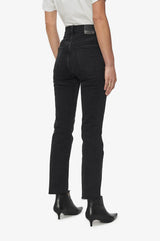 Anine Bing flared cropped high-waisted jeans with raw hem faded black